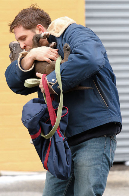 Tom Hardy Hugging His Puppy