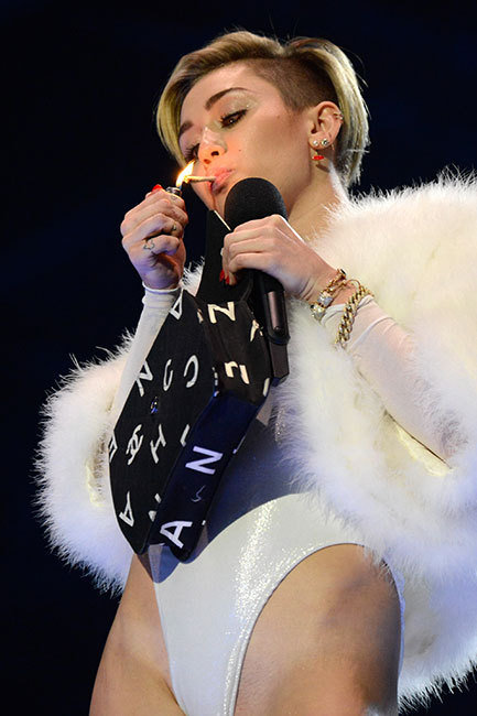 Miley Cyrus lights up at the EMAs