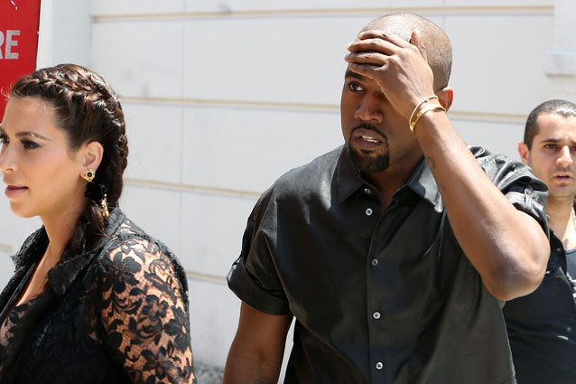 Watch Kanye West Walk Face-First into a Street Sign: Head Injuries are Funny! — VIDEO